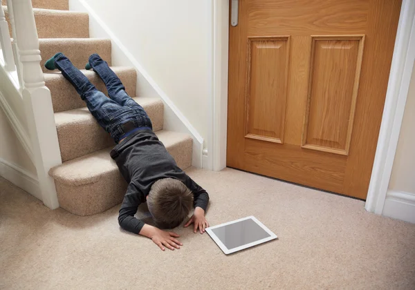 Child falling down the stairs — Stock Photo, Image