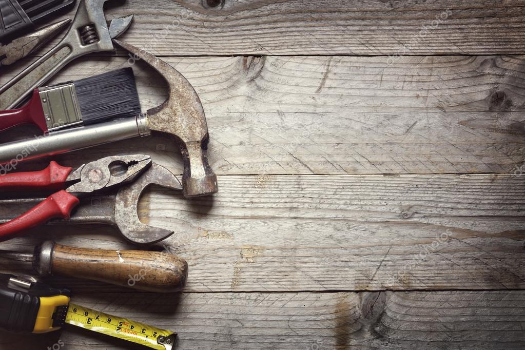 Construction tools on wooden background — Stock Photo © BrianAJackson