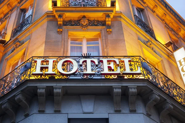 Hotel sign in Paris at night — Stock Photo, Image