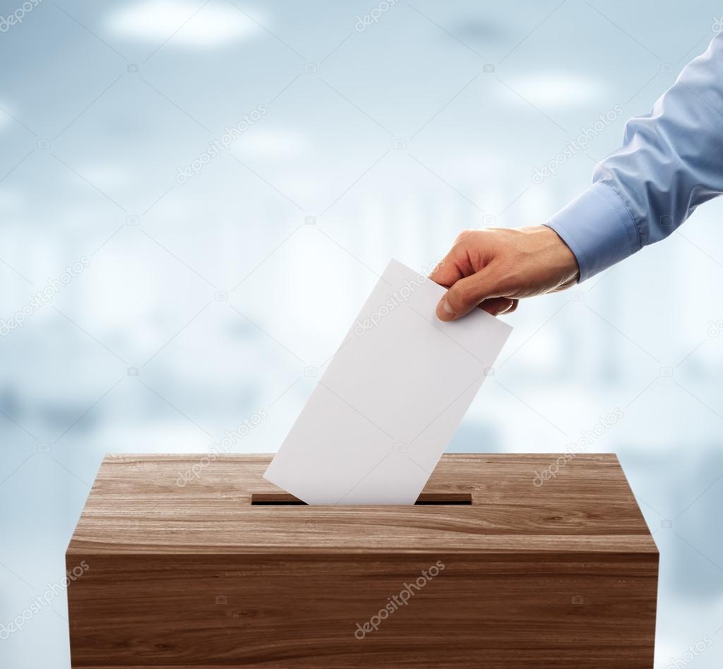 Ballot box with man casting vote