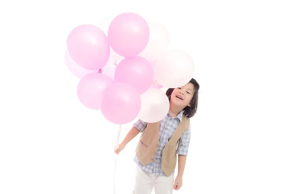 Asiatiska barn innehar rosa och vita ballonger — Stockfoto