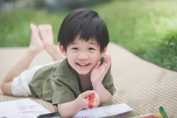 Child drawing picture with crayon — Stock Photo, Image