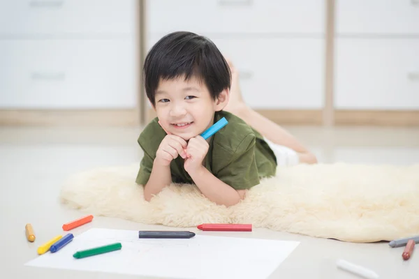 Child drawing picture with crayon — Stock Photo, Image