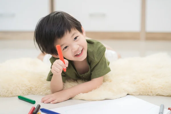 Child drawing picture with crayon — Stock Photo, Image