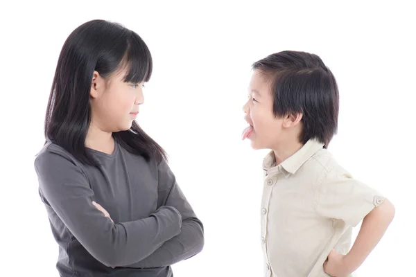 Asian sister and brother quarreling — Stock Photo, Image
