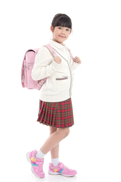 Aziatische kind in school uniform met schooltas op witte pagina — Stockfoto
