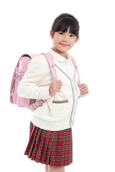 Niño asiático en uniforme escolar con bolso escolar en fondo blanco — Foto de Stock
