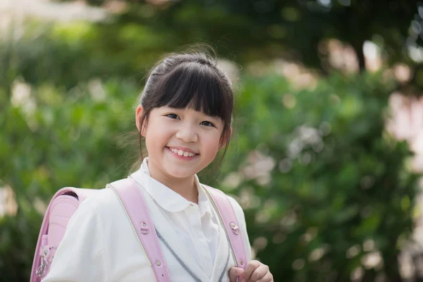 Asian school girl with pink backpack — Stock Photo, Image