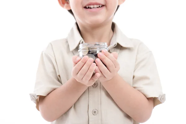 Leuke Aziatische kind geld besparen in glazen fles — Stockfoto