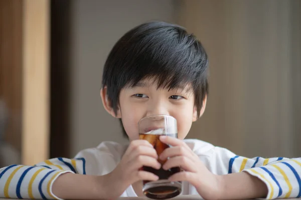 Little Asian Boy Drinking Soft Drink Coca Cola Soda — Zdjęcie stockowe