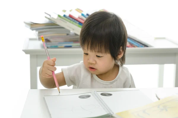 Littleboy is writing — Stock Photo, Image