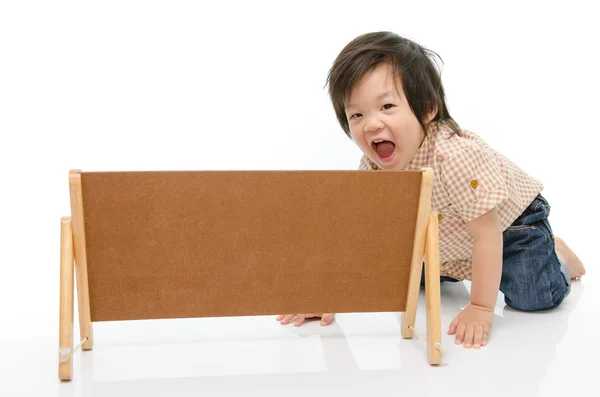 Cute baby with a woodboard — Stock Photo, Image