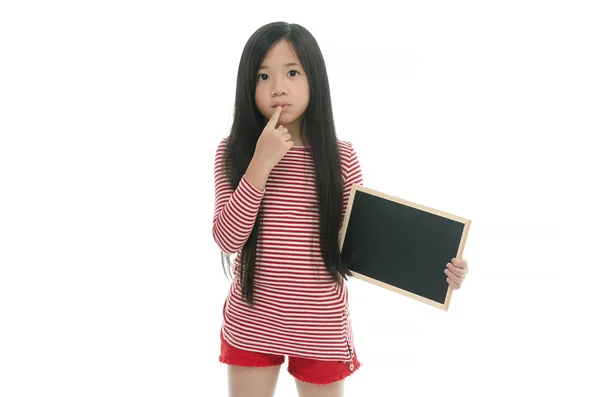 Beautiful asian girl holding chalk board and thinking — Stock Photo, Image