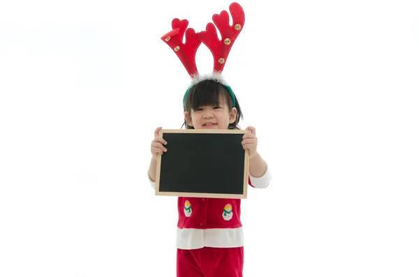 Söt asiatisk baby bära santa dräkt holding blackboard — Stockfoto