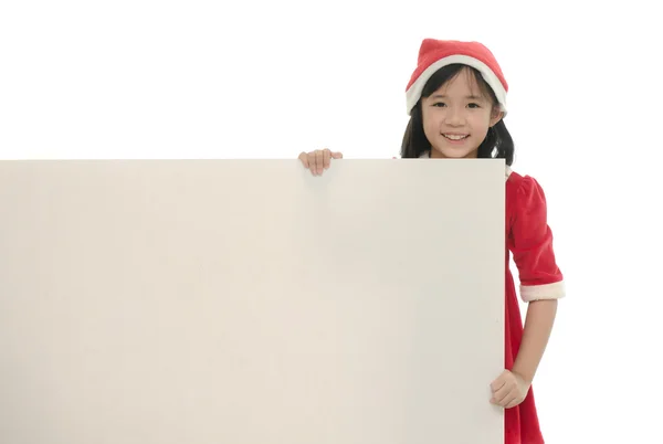 Belle fille asiatique en costume de Père Noël avec tableau blanc — Photo