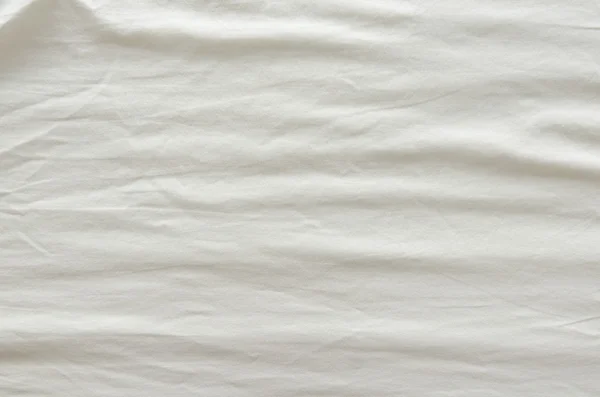 Bílé zmačkané textilie textura — Stock fotografie