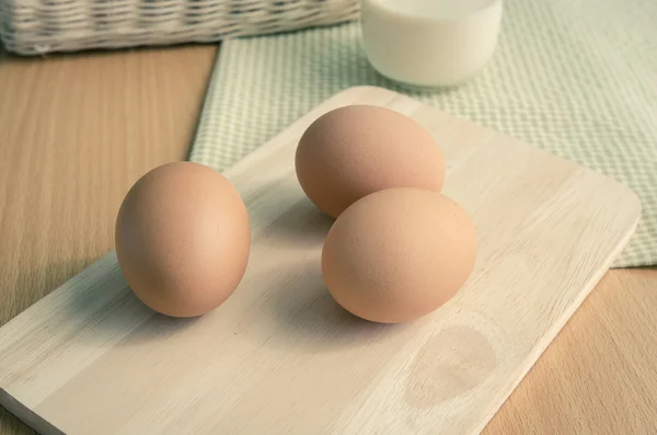 Close up of eggs on wooden table — Stock Photo, Image