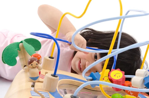 Asiatiska baby spelar utbildning leksak — Stockfoto