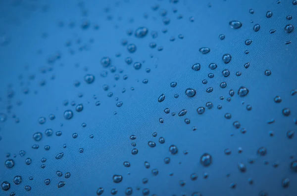 Gotas de água no guarda-chuva — Fotografia de Stock