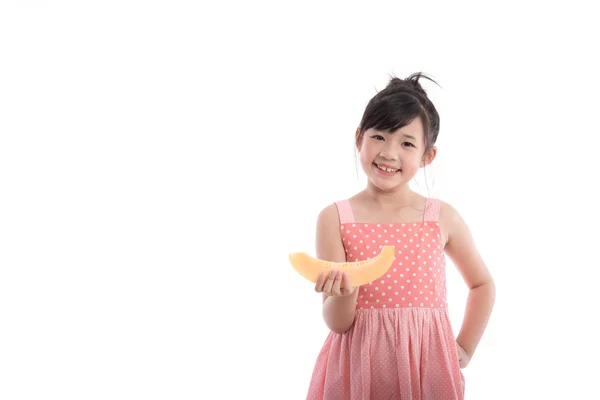 Glücklich asiatische Mädchen Hand halten Melone — Stockfoto