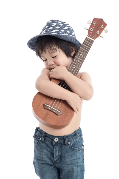 Poco asiático chico holding ukelele — Foto de Stock