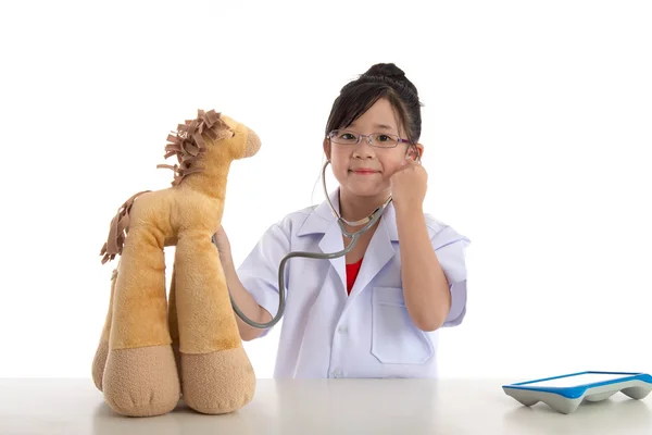 Little asian girl playing a doctor — Stock Photo, Image