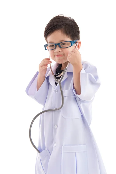 Cute asian child in a doctors uniform — Stock Photo, Image