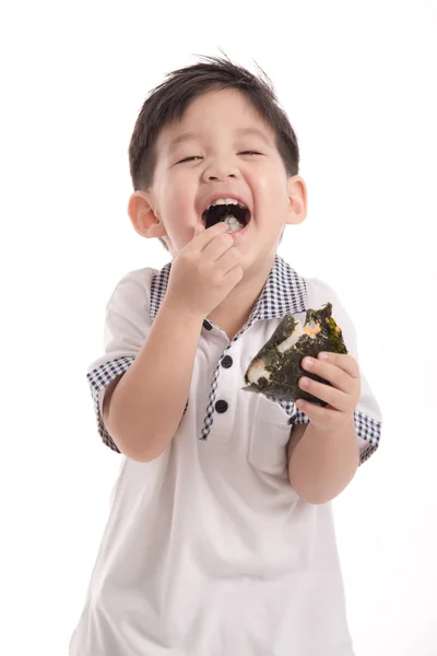 Bonito ásia criança comer arroz bola ou onigiri — Fotografia de Stock