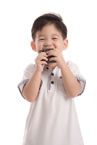 Lindo asiático niño comer arroz bola o onigiri —  Fotos de Stock