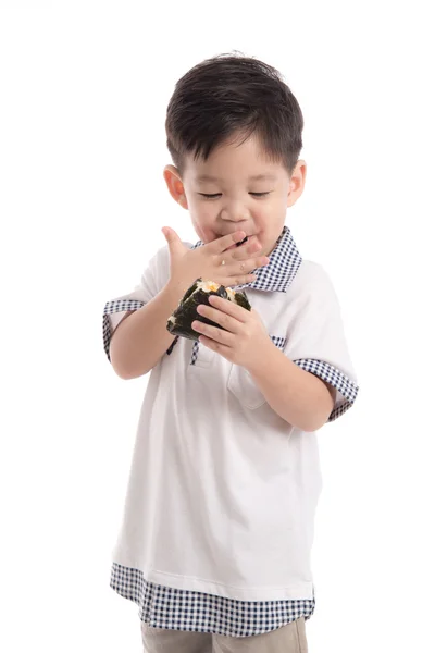 Bonito ásia criança comer arroz bola ou onigiri — Fotografia de Stock