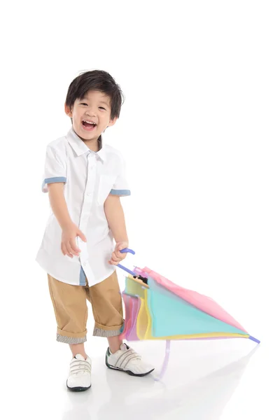 Carino asiatico ragazzo holding ombrello — Foto Stock