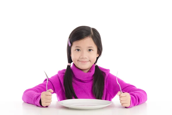 Beaytiful asian girl holding a spoon and fork — Stock Photo, Image