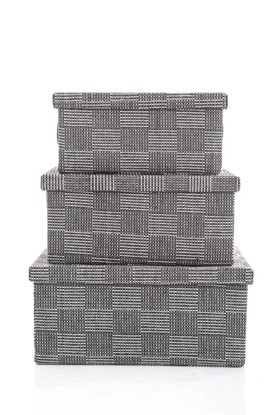 Cajas textiles grises sobre fondo blanco —  Fotos de Stock