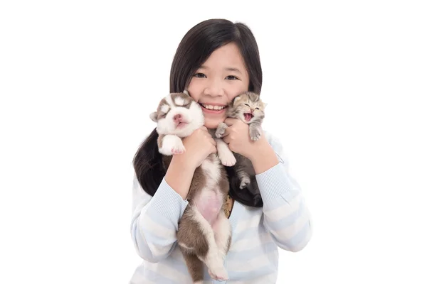 Beautiful asian girl holding newborn puppy and kitten — Stock Photo, Image