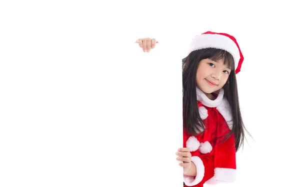 Pequeña asiática chica en en Santa Claus uniforme con un vacío bann — Foto de Stock