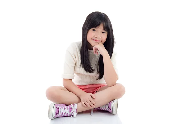 Beautiful asian girl sitting — Stock Photo, Image