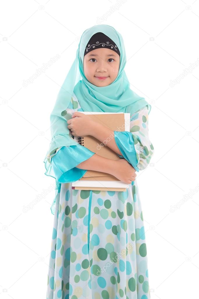 Asian muslim student holding books