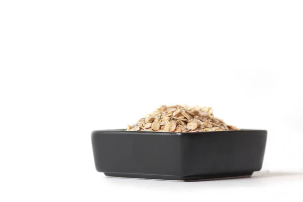 Fekete Tál Granola Elszigetelt Fehér Háttér Egészséges Étkezési Koncepció Kép — Stock Fotó