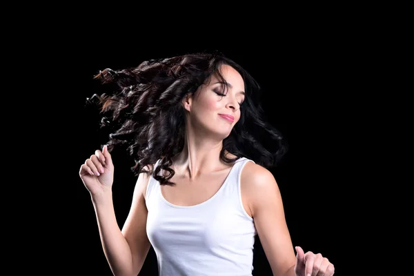 Smiling woman with closed eyes turning her head — Stock Photo, Image