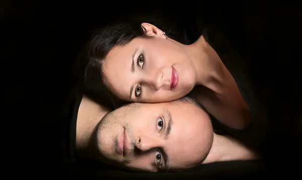 Portrait of couple in love on black background — Stock Photo, Image