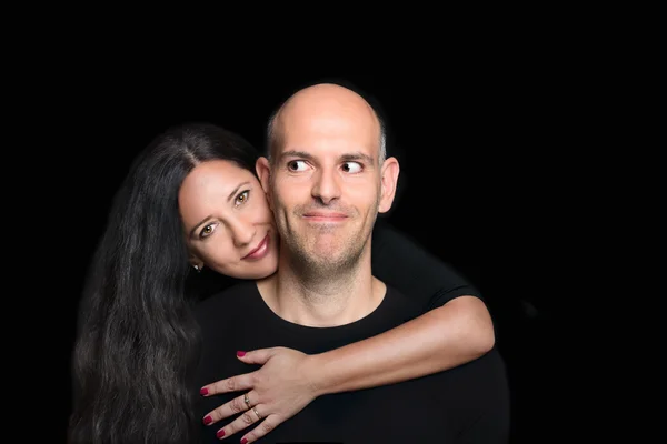 Portrait of couple in love on black background — Stock Photo, Image