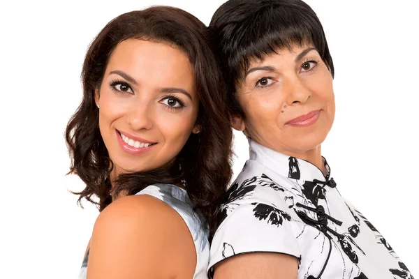 Portrait of happy mother and young daughter. Isolated Royalty Free Stock Photos