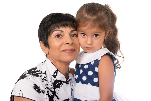 Avó com neto - mulher sênior segurando sua neta — Fotografia de Stock