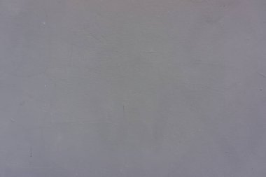 Duvarın eski alçıyla kaplı yüzeyi ince bir gri boya tabakasıyla kaplıdır. Web afişi. Tasarım için Fotn.