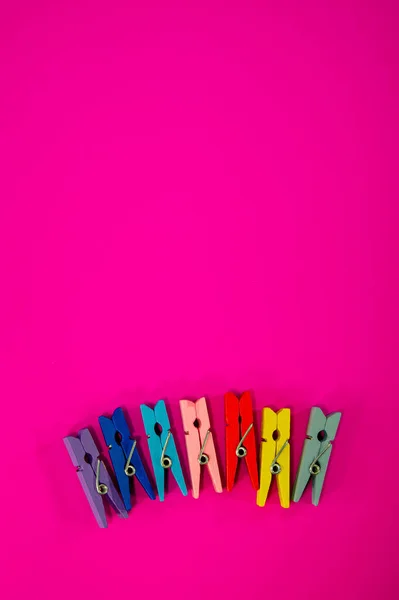 Many Colorful Clothespins Pink Background Web Banner — Stockfoto