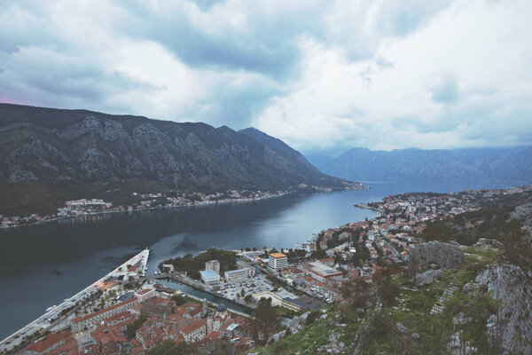 KOTOR, MONTENEGRO - October 2020: Beautiful view of Kotor bay and sunset from the Kotor Old town viewpoint, Montenegro