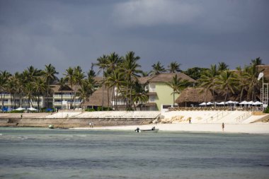 WATAMU, KENYA - December 2020: Watamu Blue Bay beach, white sandy beach, hotels, boats and people on the beach, Watamu, Kenya
