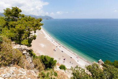 Cirali, Lycian Yolu, Olympos Sahili, Antalya Bölgesi, Türkiye 'deki turkuaz su hangarının inanılmaz manzarası