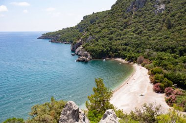 Cirali, Lycian Yolu, Olympos Sahili, Antalya Bölgesi, Türkiye 'deki turkuaz su hangarının inanılmaz manzarası