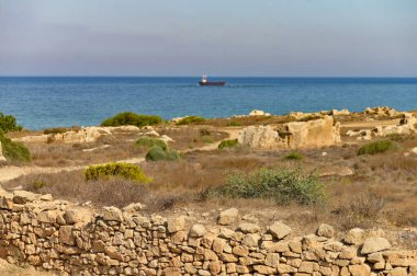 Scenic view of seascape with ship on the horizon